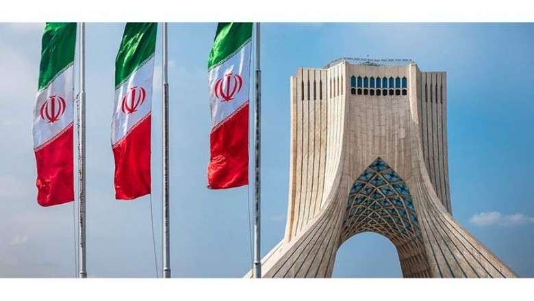 Iranian professor jailed in US returns home